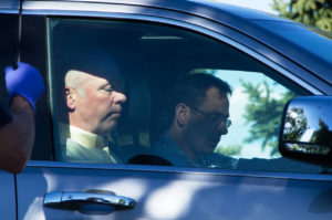                Republican candidate for Montana's only U.S. House seat, Greg Gianforte, sits in a vehicle near a Discovery Drive building Wednesday, May 24, 2017, in Bozeman, Mont. A reporter said Gianforte "body-slammed" him Wednesday, the day before the special election. (Freddy Monares/Bozeman Daily Chronicle via AP)             