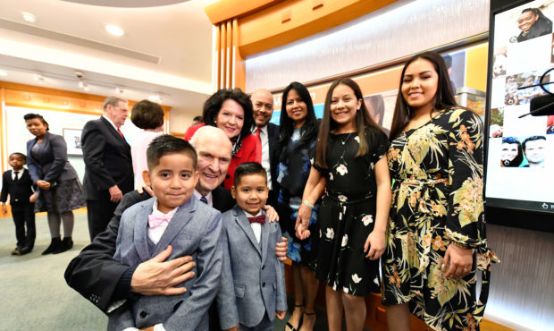 President Russell M. Nelson and his wife, Wendy, greet six-year-old Juan David Vargas Saavedra and ...