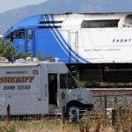 A FrontRunner train is stopped as a bomb squad investigates a suspicious package just north of Station Park in Farmington on Saturday, July 7, 2018. (Ravell Call, Deseret News)