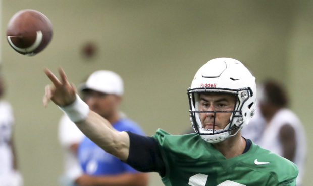 BYU quarterback Tanner Mangum fires a pass during football practice in Provo on Friday, Aug. 3, 201...