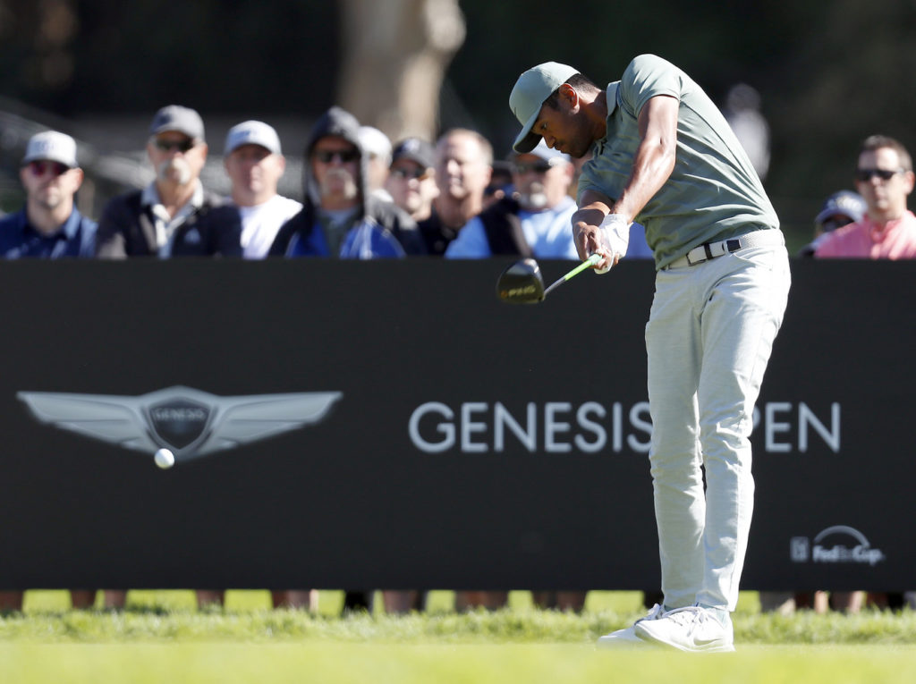 Tony Finau hits his tee shot on the second hole during the final round of the Genesis Open golf tournament at Riviera Country Club Sunday, Feb. 18, 2018, in the Pacific Palisades area of Los Angeles. (AP Photo/Ryan Kang) (Photo: Ryan Kang, Associated Press)