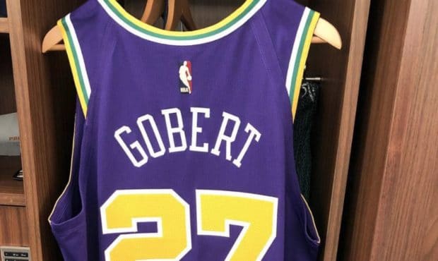 Rudy Gobert reveals his throwback jersey saying "throwing it back but always lookin ahead". (Rudy G...