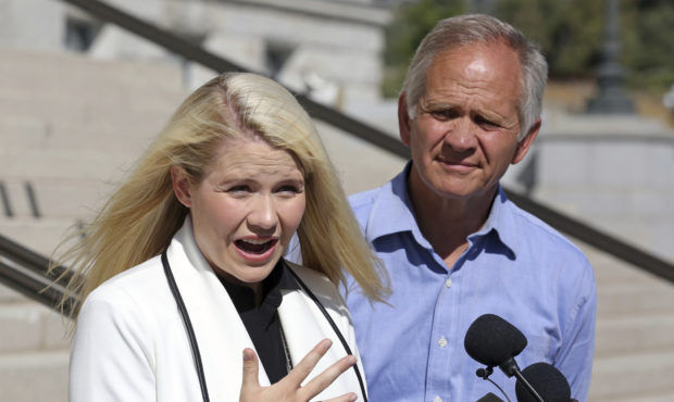 Elizabeth Smart speaks during a news conference while her father Ed Smart looks on Thursday, Sept. ...