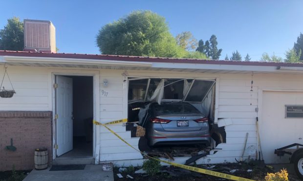 An unidentified driver drove into a home in Orem....