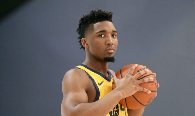 Donovan Mitchell poses for photos during Jazz Media Day at the Zions Bank Basketball Center in Salt...