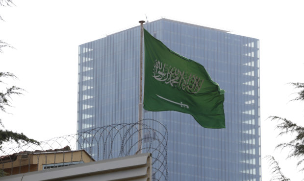 The Saudi Arabia flag flies over the consulate in Istanbul, Wednesday, Oct. 3, 2018. A Saudi journa...