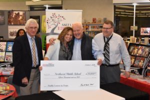McBride presented Northwest with a $15K check