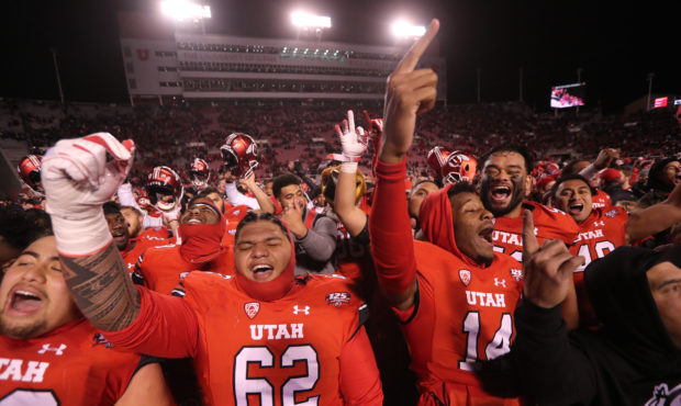 Utah players light the U as they defeat BYU at Rice Eccles Stadium in Salt Lake City on Sunday, Nov...