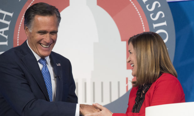 U.S. Senate Candidates Mitt Romney (R) and Jenny Wilson (D) shake hands following the debate in the...