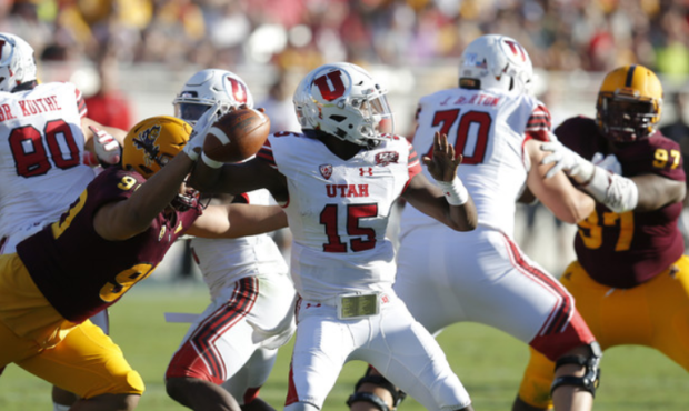 Utah quarterback Jason Shelley (15) in the second half during an NCAA college football game against...