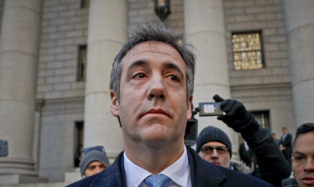 FILE - In this Nov. 29, 2018, file photo, Michael Cohen walks out of federal court in New York. The...