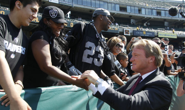 FILE - In this Aug. 13, 2012, file photo, NFL broadcaster and former Oakland Raiders head coach Jon...