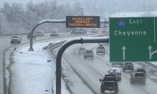 Snowy conditions slows the speed limit on I-80 near the mouth of Parleys Canyon in Salt Lake City o...