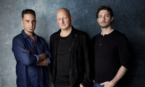 Wade Robson, from left, director Dan Reed and James Safechuck pose for a portrait to promote the fi...