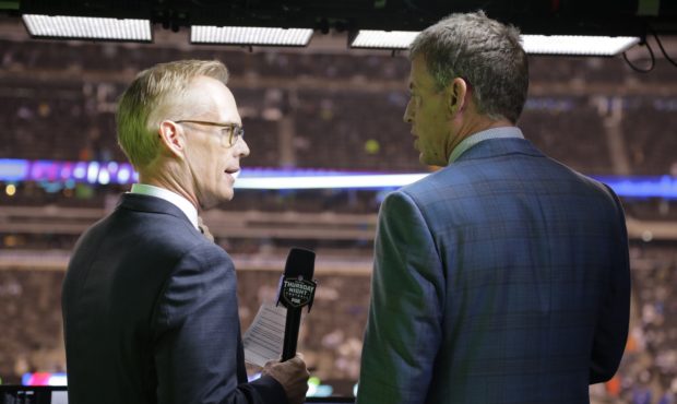FILE - This Oct. 11, 2018, file photo shows Troy Aikman, right, and Joe Buck working before an NFL ...