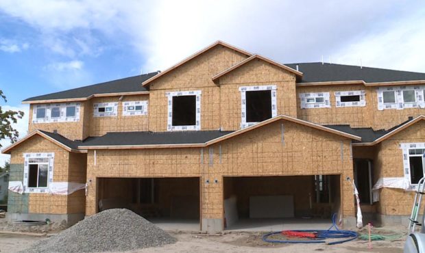 Utah home prices continue to rise - house under construction...