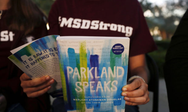 In this Wednesday, Jan. 16, 2019, photo, Leni Steinhardt, 16, reads from a new book called "Parklan...
