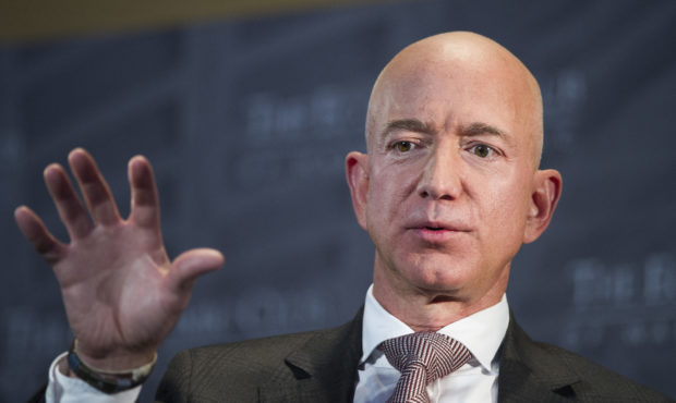 FILE- In this Sept. 13, 2018, file photo Jeff Bezos, Amazon founder and CEO, speaks at The Economic...