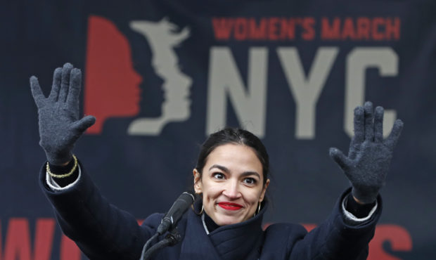 FILE - In this Jan. 19, 2019, file photo, U.S. Rep. Alexandria Ocasio-Cortez, D-New York, waves to ...