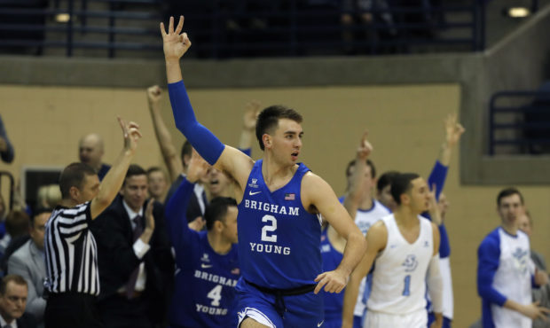 Brigham Young guard Zac Seljaas reacts after making a three-point shot during the second half of an...