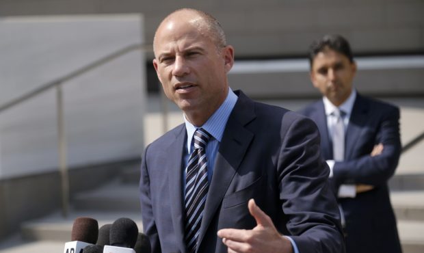 FILE - In this July 27, 2018 file photo, attorney Michael Avenatti replies to questions by reporter...