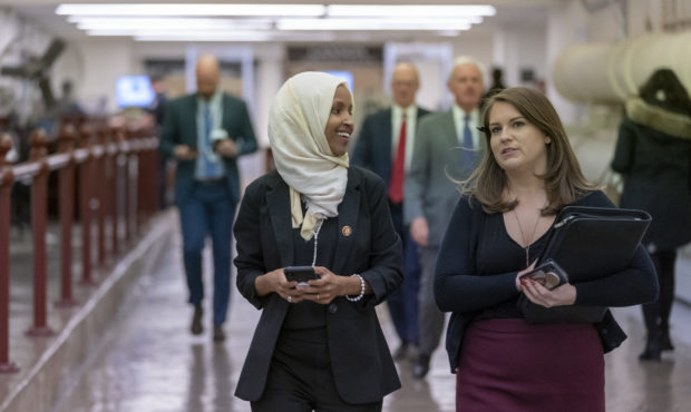 Rep. Ilhan Omar, D-Minn., walks to the chamber Thursday, March 7, 2019, on Capitol Hill in Washingt...