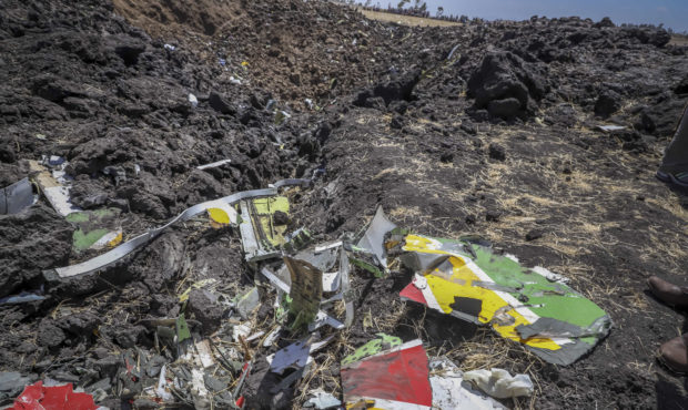 Wreckage lies at the scene of an Ethiopian Airlines flight that crashed shortly after takeoff at He...