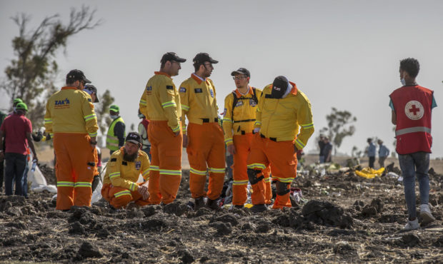 Investigators from Israel examine wreckage at the scene where the Ethiopian Airlines Boeing 737 Max...
