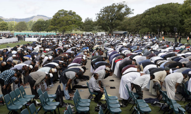 Muslims pray during Friday prayers at Hagley Park in Christchurch, New Zealand, Friday, March 22, 2...