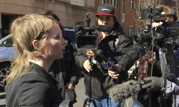 In this Tuesday, March 5, 2019 photo, Chelsea Manning addresses the media outside federal court in ...