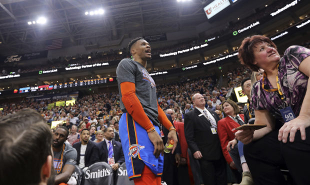 Oklahoma City Thunder's Russell Westbrook gets into a heated verbal altercation with fans in the fi...