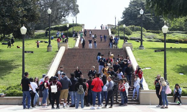 People move about the campus of the University of California, Los Angeles Friday, April 26, 2019. S...