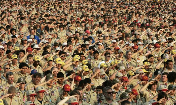 FILE - In this July 31, 2005 file photo, Boy Scouts salute as they recite the Pledge of Allegiance ...