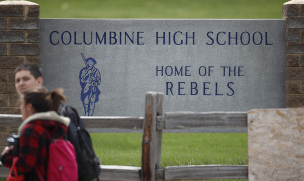 Students leave Columbine High School late Tuesday, April 16, 2019, in Littleton, Colo. Following a ...