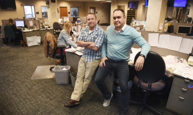 In this April 9, 2019, photo, Argus Leader investigative reporter Jonathan Ellis and news director ...
