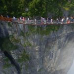 Known for its towering sandstone pillars, this forest is best explored on foot. Visitors can experience spectacular views on the 100-meter-long and 1.6-meter-wide glass skywalk clinging to the cliff of Tianmen Mountain.