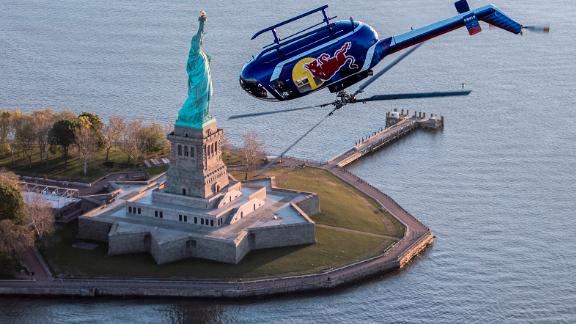 Red Bull Aerobatic Helicopter Pilot, Aaron Fitzgerald, performs flips, barrel rolls and nose dives ...