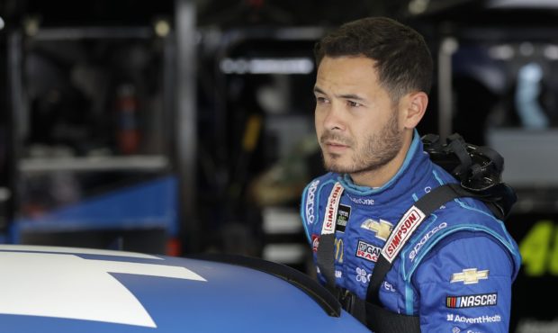 Kyle Larson climbs into his car before practice for Sunday's NASCAR Coca-Cola 600 Cup series auto r...