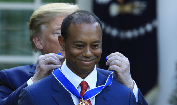President Donald Trump awards the Presidential Medal of Freedom to Tiger Woods during a ceremony in...