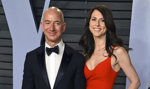 FILE - In this March 4, 2018 file photo, Jeff Bezos and wife MacKenzie Bezos arrive at the Vanity F...