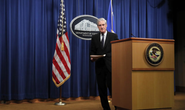 Special counsel Robert Muller walks from the podium after speaking at the Department of Justice Wed...