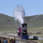 The Jupiter, Central Pacific's No. 60 arrives for the commemoration of the 150th anniversary of the Transcontinental Railroad completion at the Golden Spike National Historical Park Friday, May 10, 2019, in Promontory, Utah. People from all over the country are gathering at a remote spot in Utah to celebrate Friday's 150th anniversary of the completion of the Transcontinental Railroad. (AP Photo/Rick Bowmer)