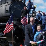 Union Pacific CEO Lance Fritz and Margaret Yee, the descendant of Chinese immigrants who built the railroad, pose with the crew of Big Boy No. 4014. Photo: Colby Walker, KSL Newsradio 