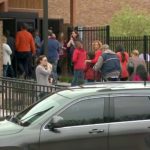 Parents were directed to a recreation center to pick up their children, following a shooting at the STEM School Highlands Ranch in Colorado. Photo: KDVR/KWGN