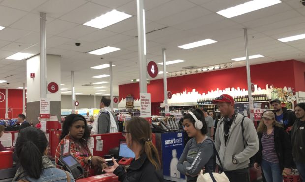 Customers wait on a long check out line at a Target store in San Francisco on Saturday, June 15, 20...