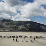 A gathering at the Great Salt Lake in hopes of making it into the record books fell way short Saturday, June 8, 2019, near Magna, Utah. Utah park officials invited people to a beach on the lake's south end in an attempt to set the world record for the largest number of people floating together, unassisted, in a line at one time. Utah State Parks manager Jim Wells said only about 300 people showed up for the event. According to the Guinness World Records website , Argentina holds the current record after 1,941 people successfully floated together on the surface of Lago Epecuén de Carhué in 2017. (AP Photo/Rick Bowmer)
