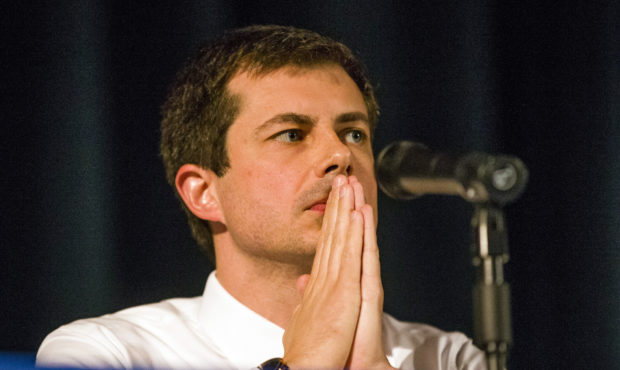 Democratic presidential candidate and South Bend Mayor Pete Buttigieg looks on during a town hall c...