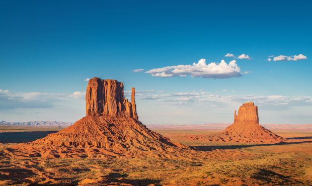 Photo courtesy of Getty Images. Scenic view to the famous West and East Mittens Buttes in warm late...