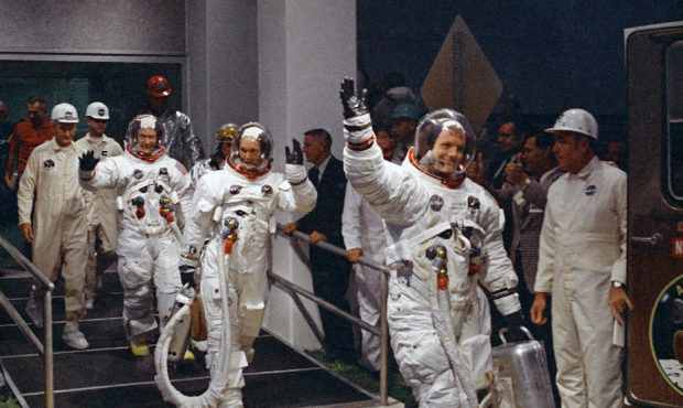 FILE - In this July 16, 1969 file photo, from right, Neil Armstrong, Michael Collins and Buzz Aldri...