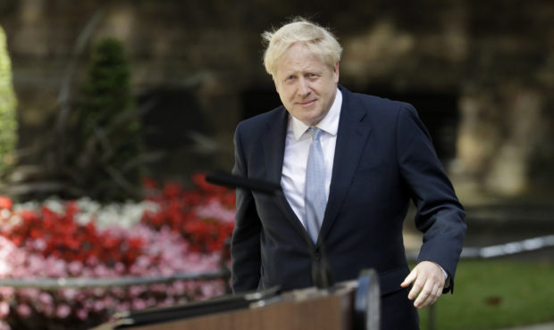 Britain's new Prime Minister Boris Johnson arrives to make a speech outside 10 Downing Street, Lond...